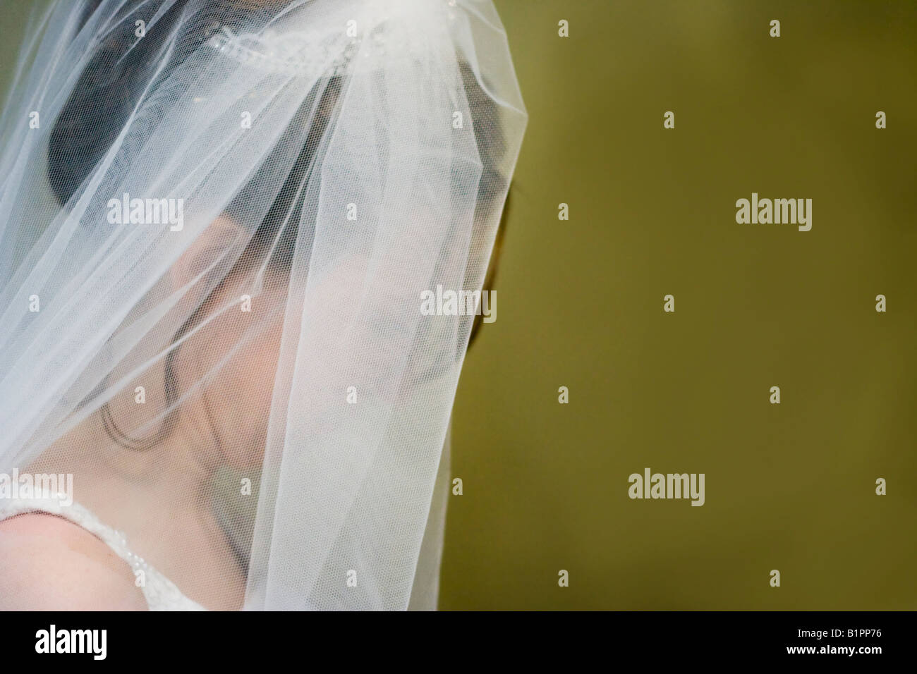 Woman in wedding dress waiting Stock Photo