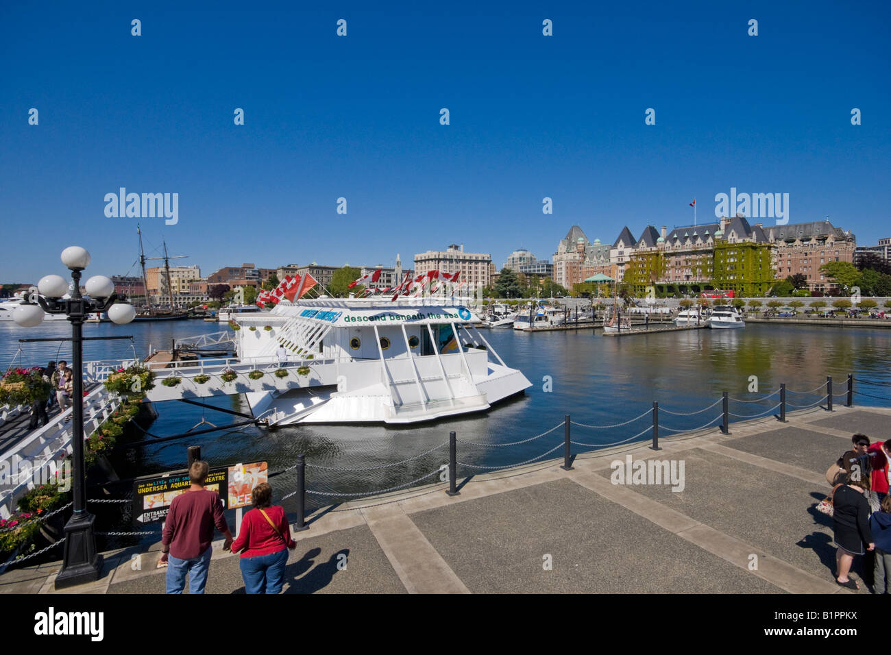 View of inner Victoria Harbour British Columbia Canada with Pacific Undersea Gardens left and Fairmont Empress Hotel right Stock Photo
