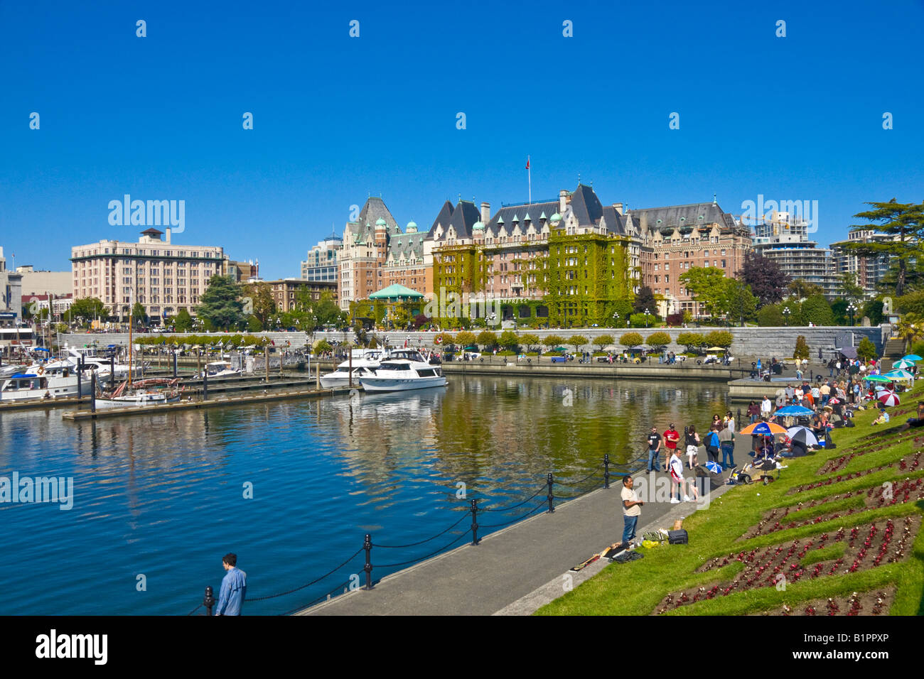 Victoria inner harbour with a view towards the world famous Fairmont Empress Hotel Stock Photo