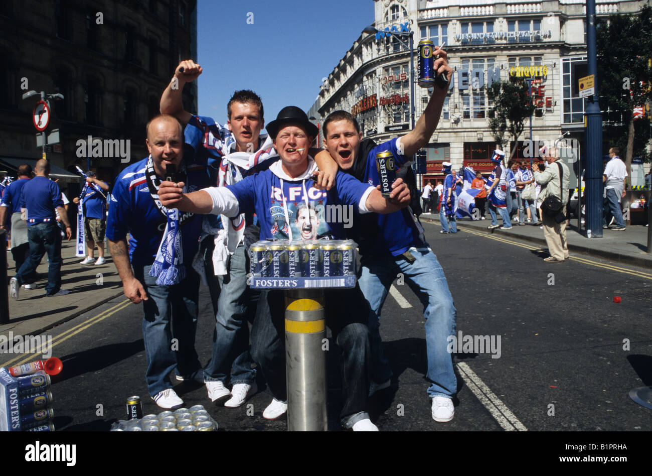 Rangers Football Fans Stocked Up With Beer Before The Match In Manchester Stock Photo