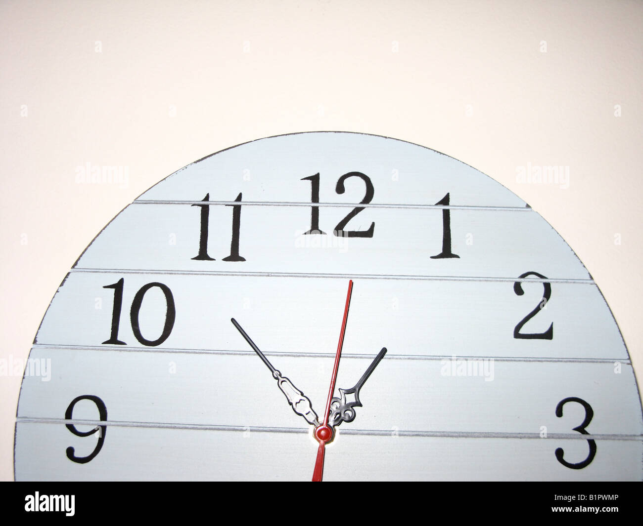White clock hanging on wall Stock Photo Alamy