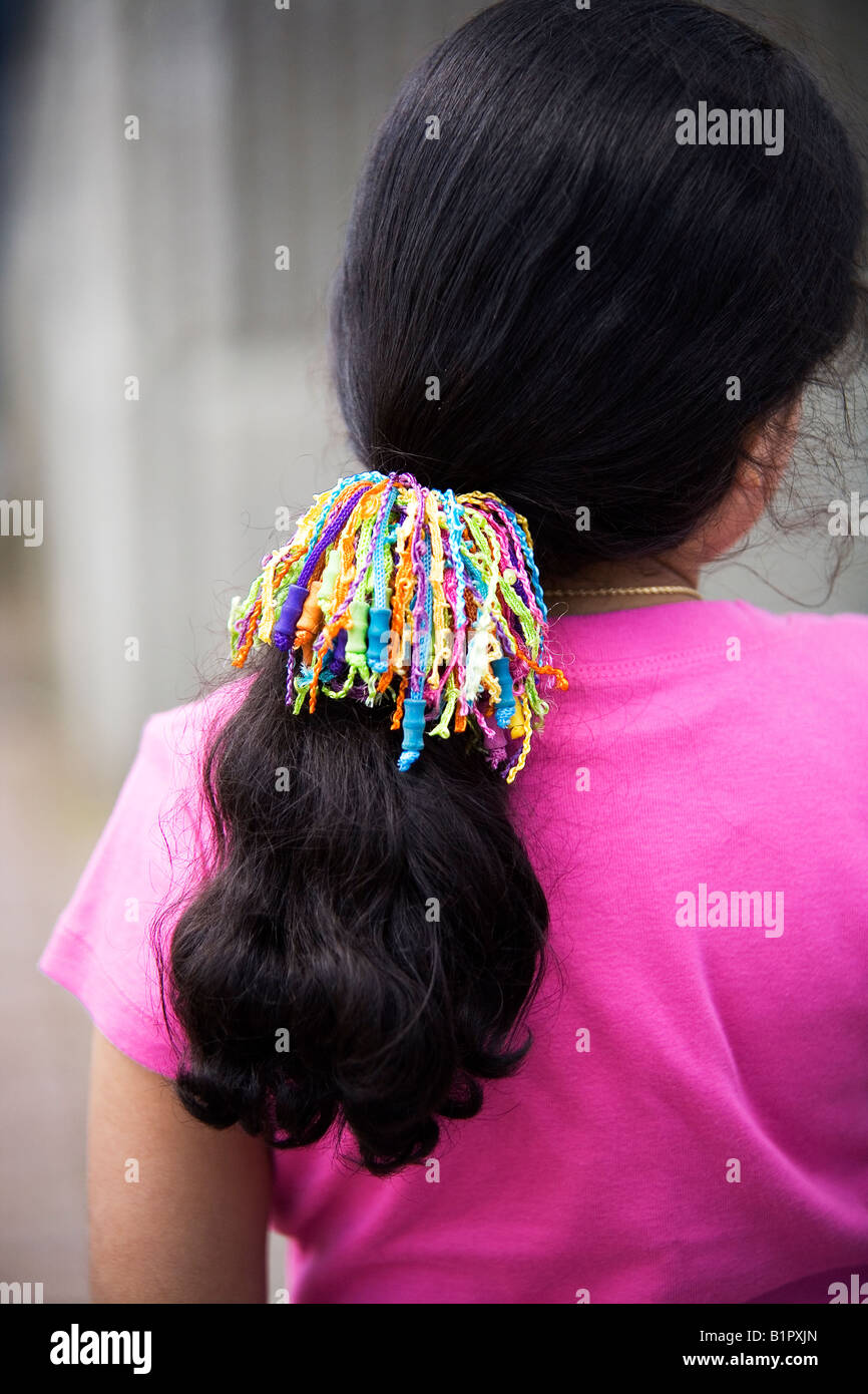 Pony tail closeup with colorful holder. Stock Photo