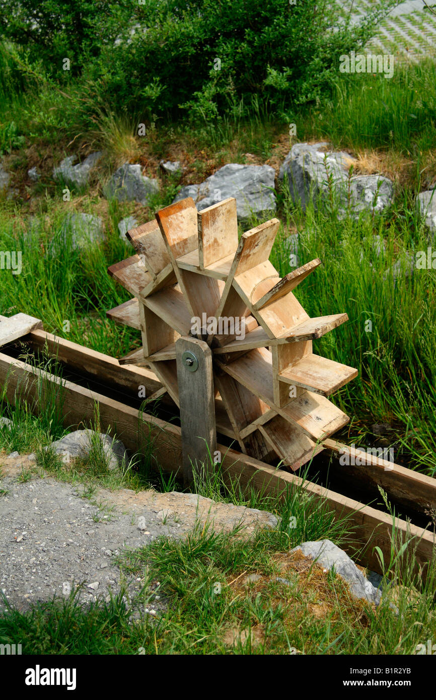 Water wheel on the Langenegg Energy Trail, Austria Stock Photo
