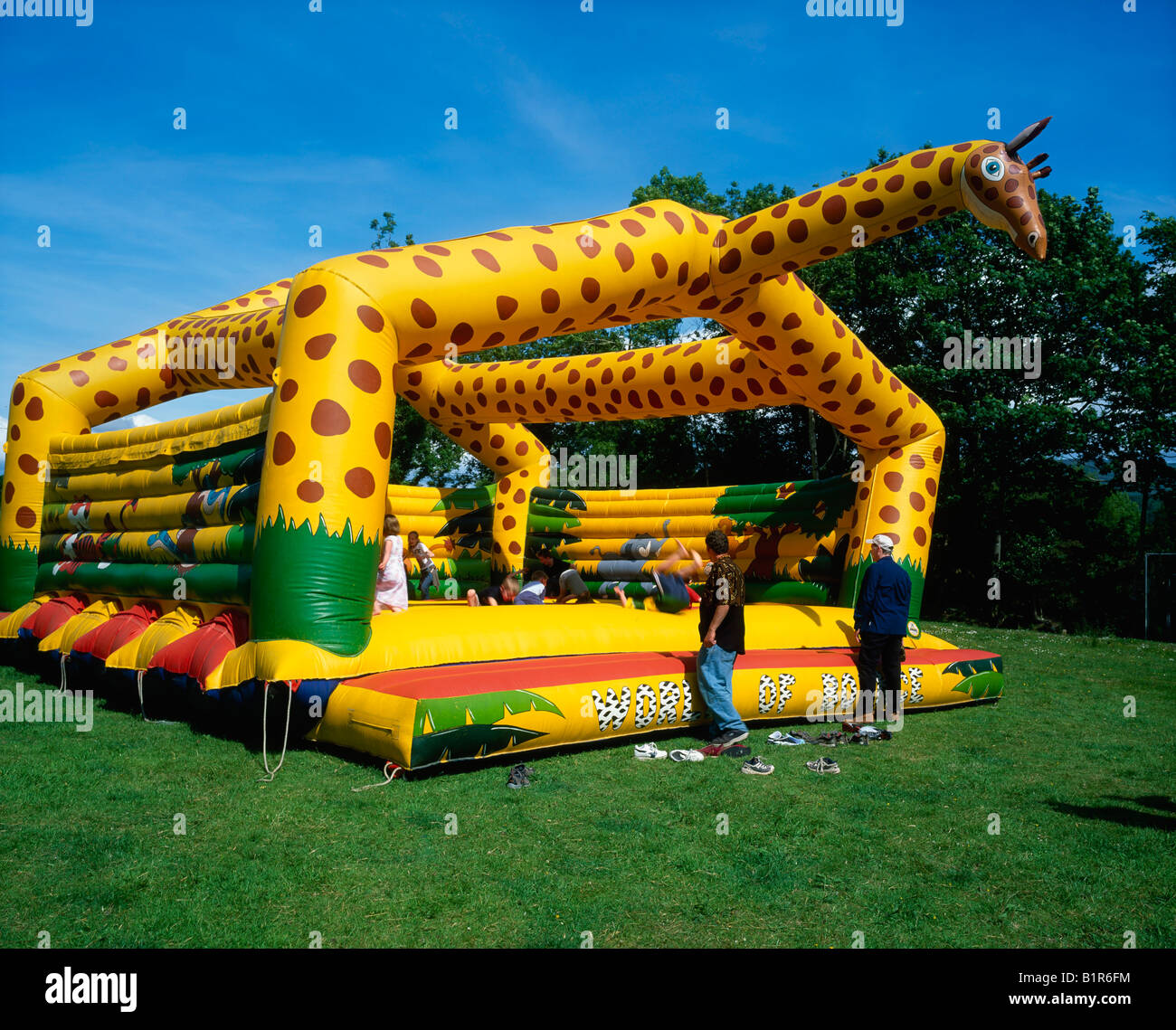 Bouncy castle children parents hires stock photography and images Alamy