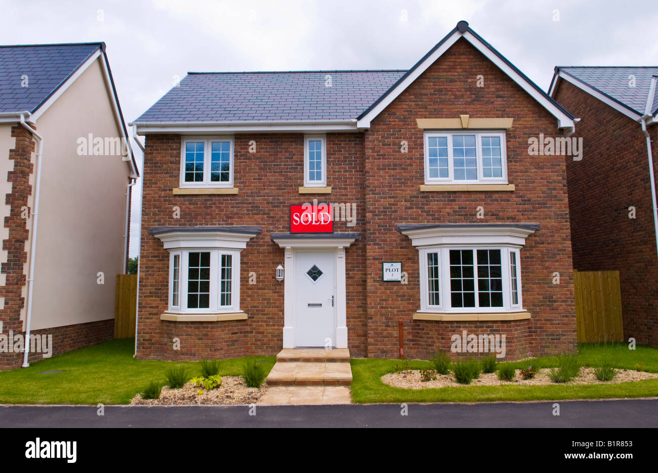 Newly built house marked as SOLD on Barratt estate at Llanfoist near Abergavenny Monmouthshire South Wales UK EU Stock Photo