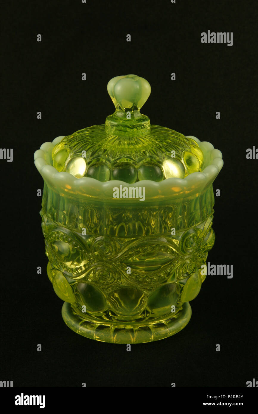 Uranium or vaseline glass sugar bowl with lid shown under normal lighting  Stock Photo - Alamy