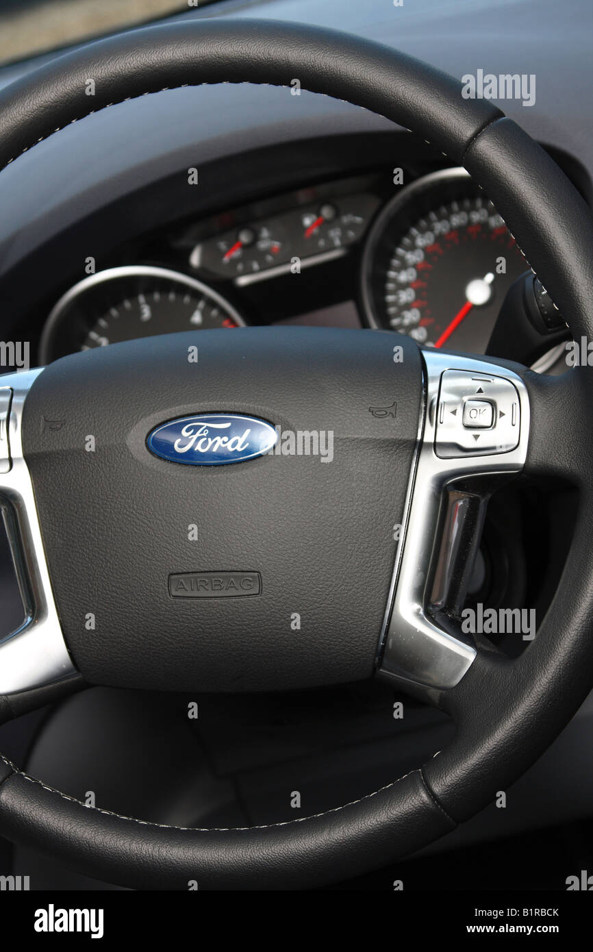 A Ford motor car steering wheel with drivers airbag Stock Photo