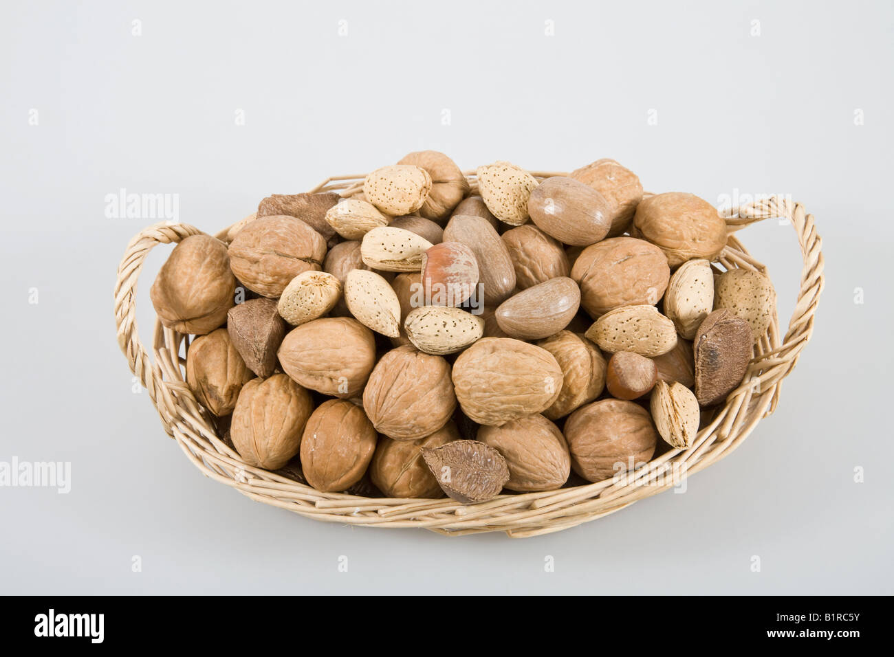 Basket of mixed nuts Stock Photo