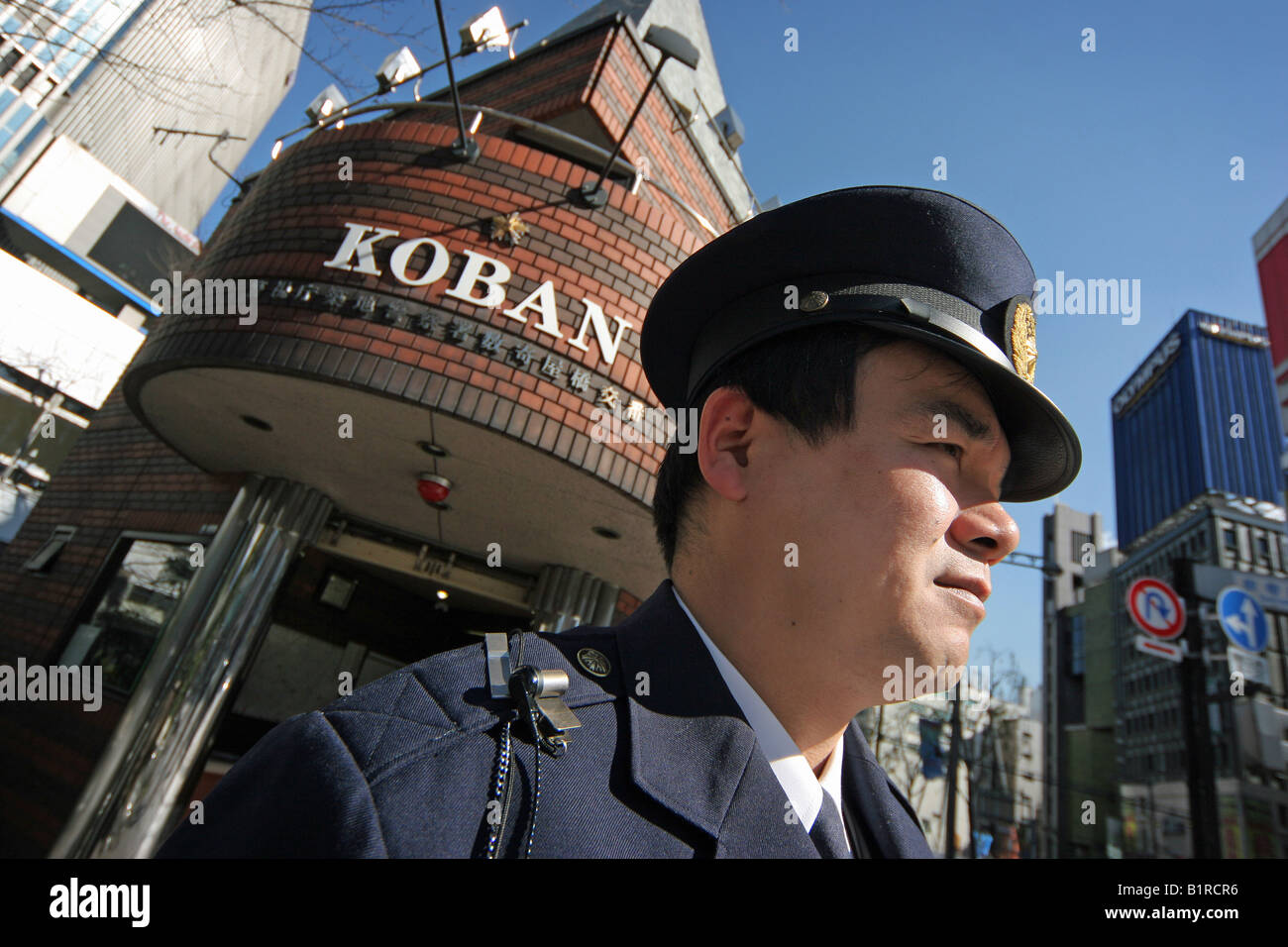Koban Police Officer by his box in Ginza Tokyo Japan Stock Photo