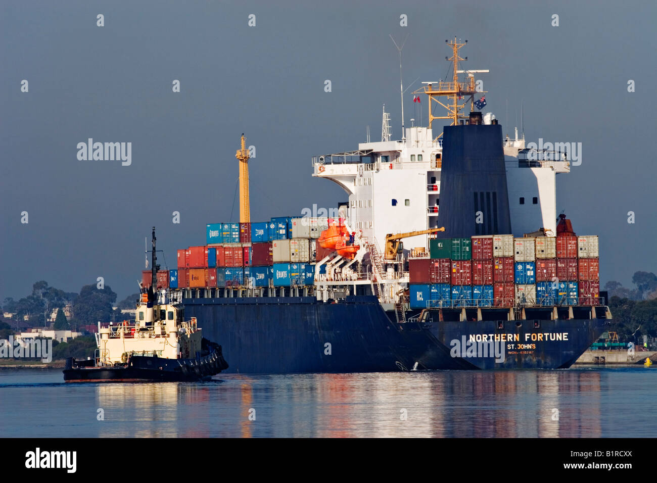 Shipping Industry / A Container Ship is outbound in the 'Port of Melbourne' Australia. Stock Photo