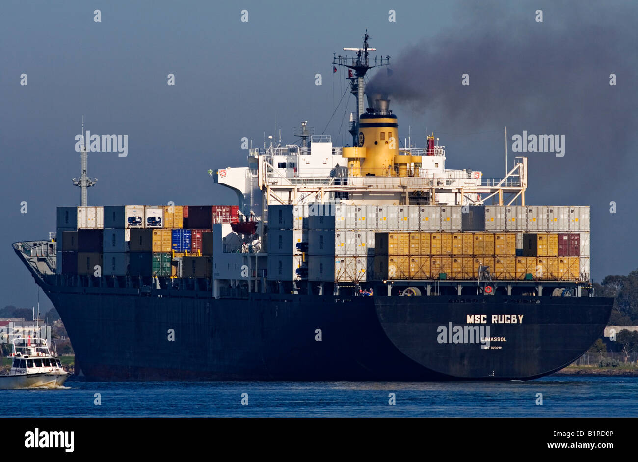 Shipping Industry / A Container Ship is outbound in the 'Port of Melbourne' Australia. Stock Photo
