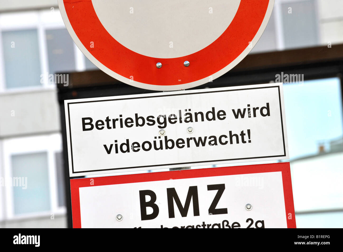 Warning sign reading Betriebsgelaende wird videoueberwacht, factory premises under video surveillance, Ingolstadt, Bavaria, Ger Stock Photo
