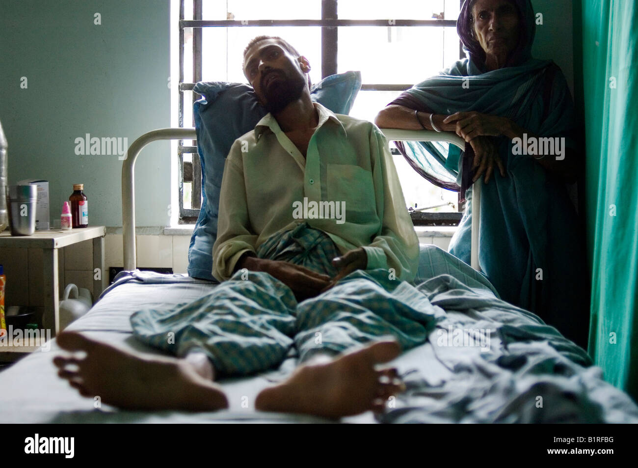Anwari Mondol, aged 35, has a life threatening TB or tuberculosis infection, his stay in the Shree Jain private hospital is cov Stock Photo