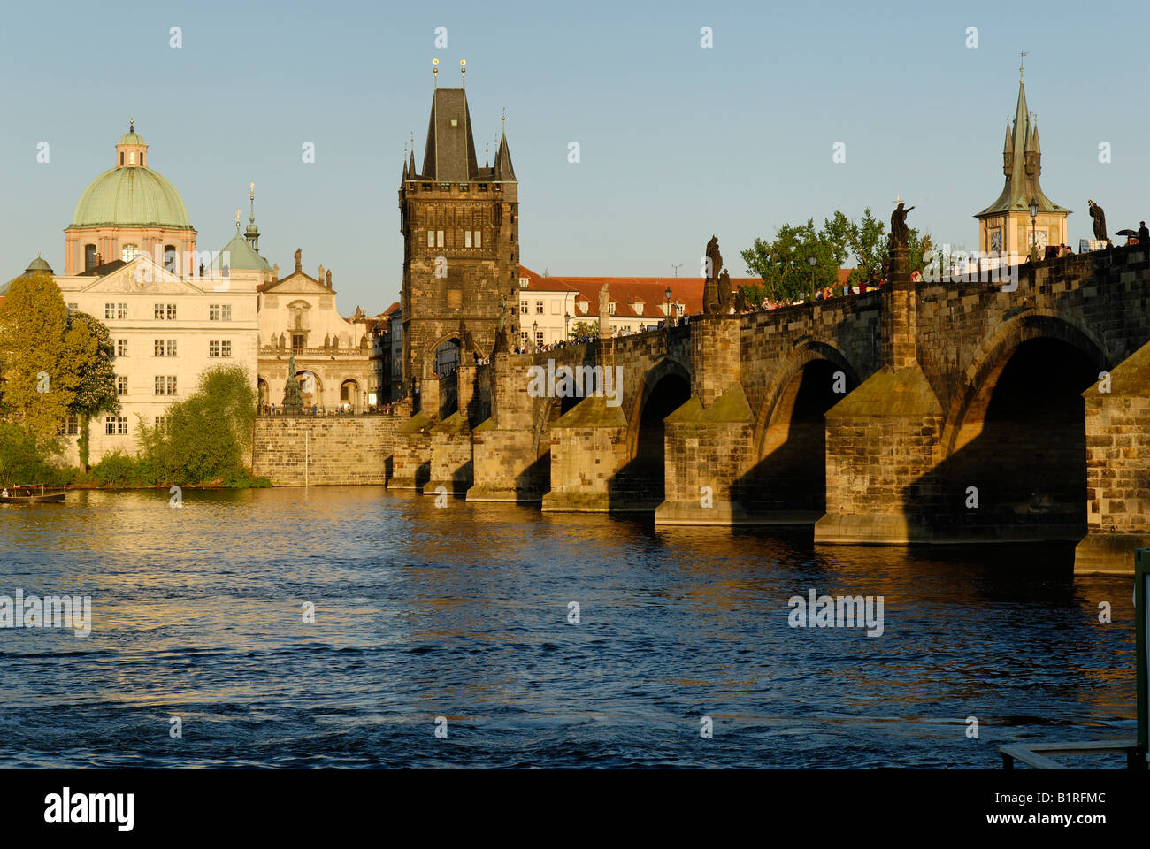 Charles Bridge and the historic Old Town Bridge Tower on the Vltava River, UNESCO World Heritage Site, Prague, Czech Republic,  Stock Photo