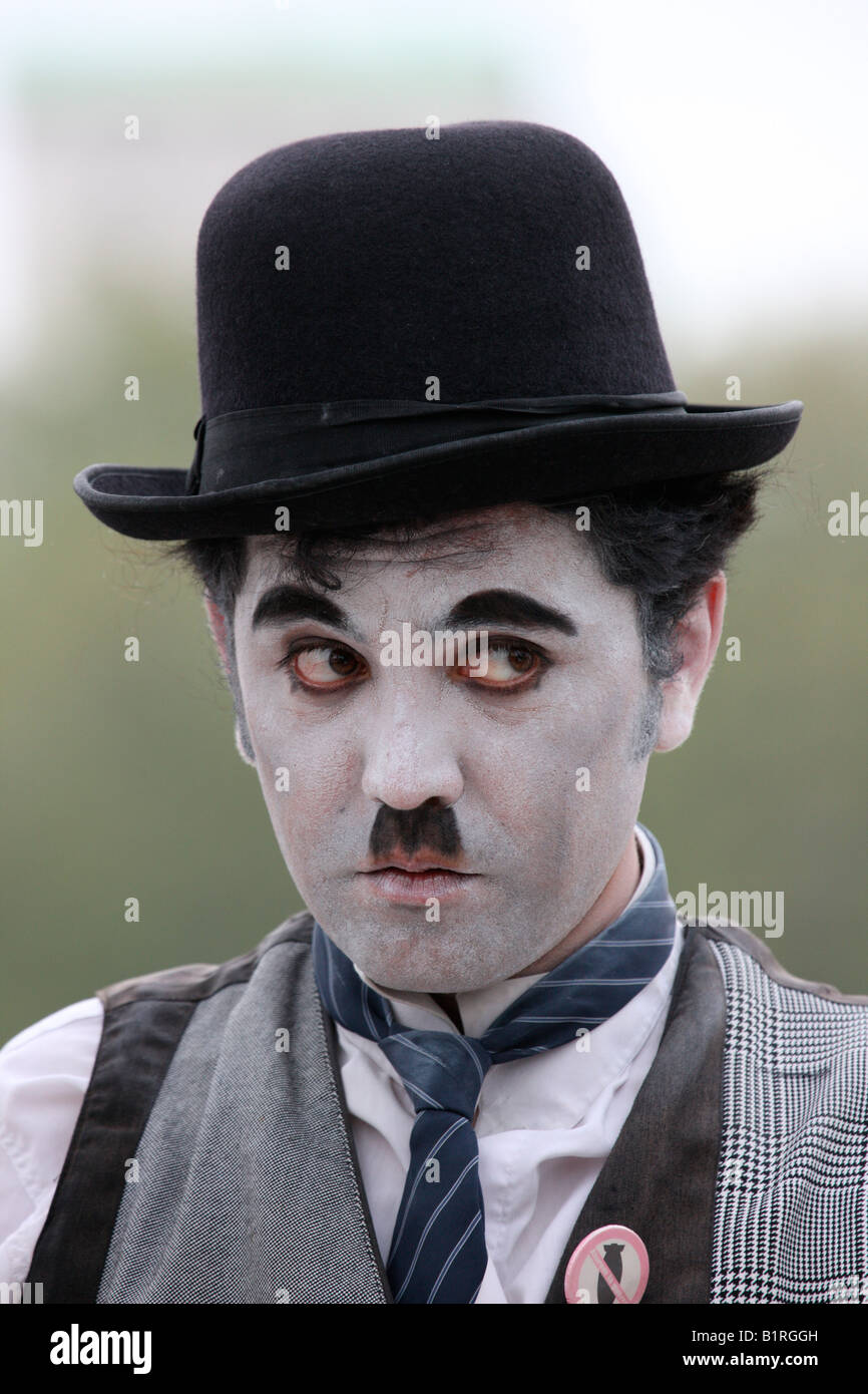 Charlie chaplin impersonator hi-res stock photography and images - Alamy