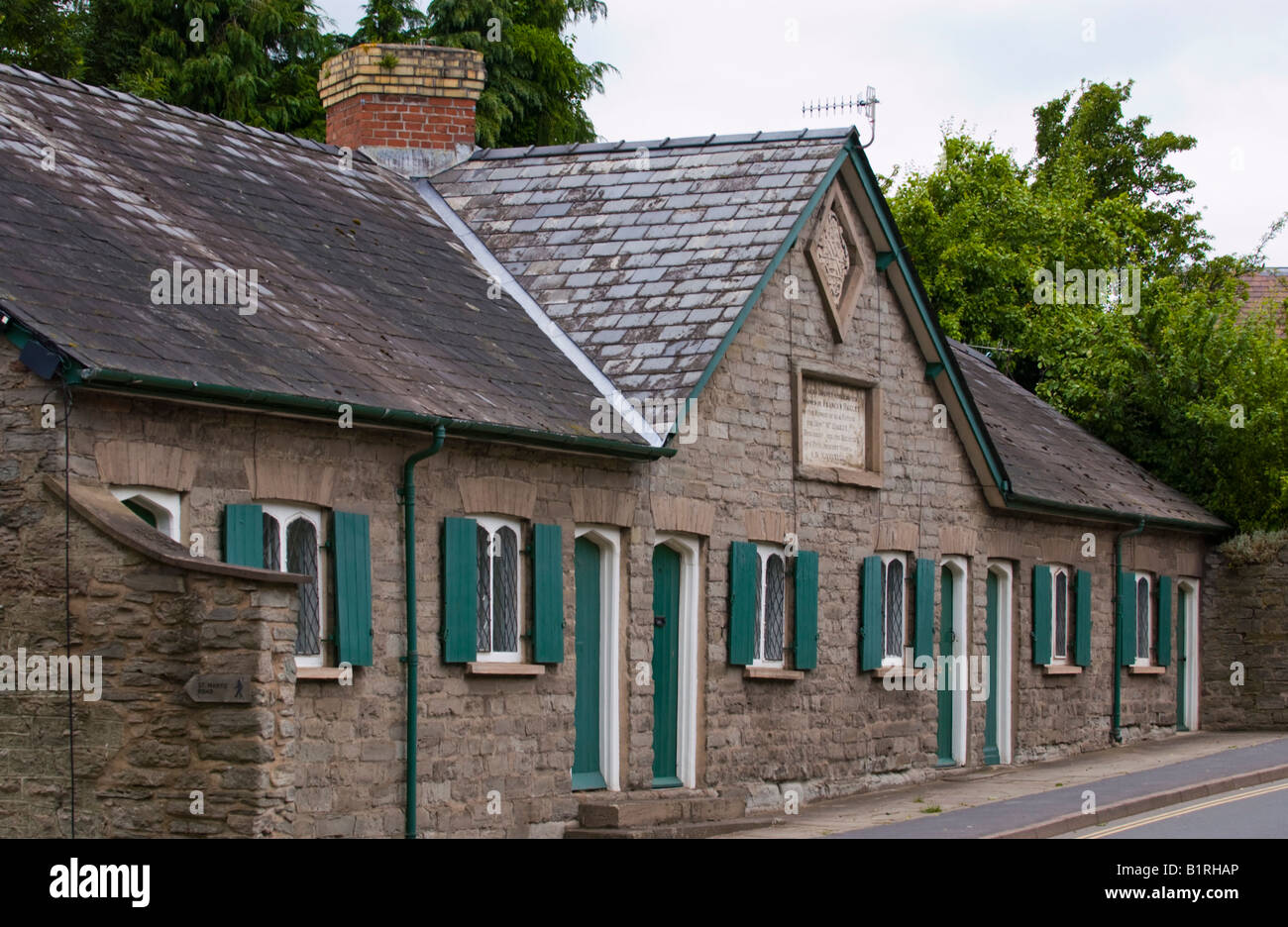 Harley Alms Houses built in 1832 for indigent ladies in Hay on Wye Powys Wales UK EU Stock Photo