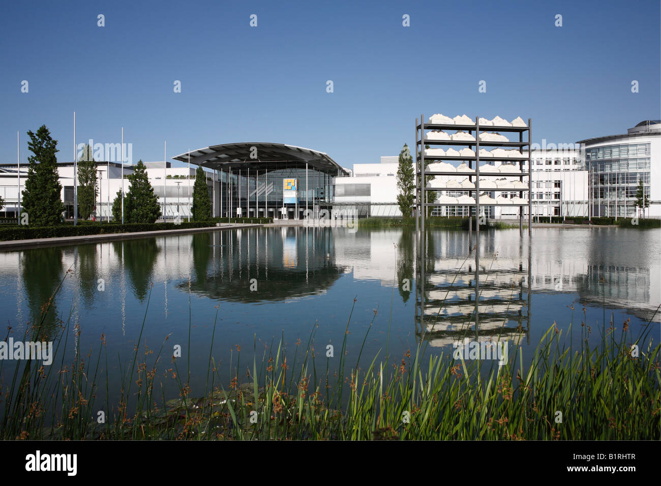 New Munich Trade Fair Centre lake and main entrance, Riem, Munich, Bavaria, Germany, Europe Stock Photo