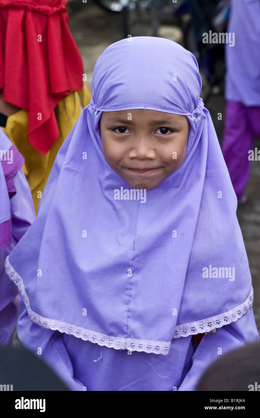 Young Muslim girl dressed in traditional school clothing at a school in Mataram, Lombok Island, Lesser Sunda Islands, Indonesia Stock Photo