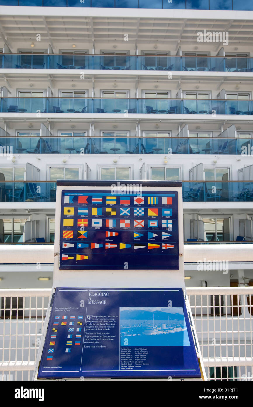 Display showing maritime signal flags, at back the passenger cruise liner 'Diamond Princess', docked in Vancouver, British Colu Stock Photo