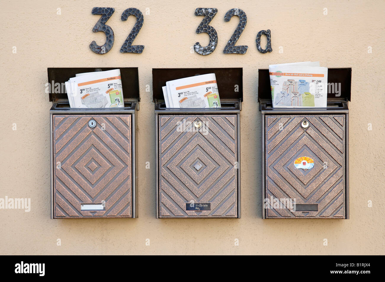 Three letterboxes, mailboxes, each with a circular inserted, Eckental