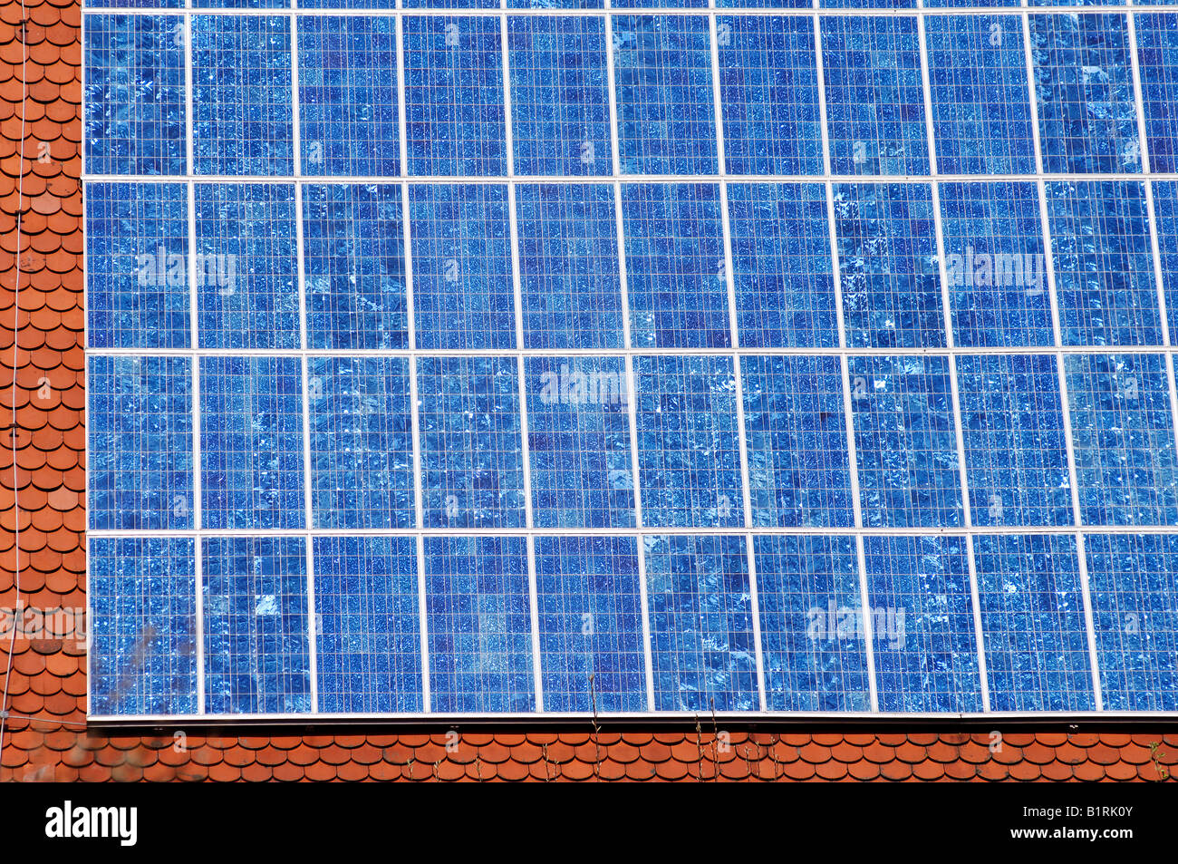Photovoltaic cells, solar panels installed on a roof, Guenthersbuehl