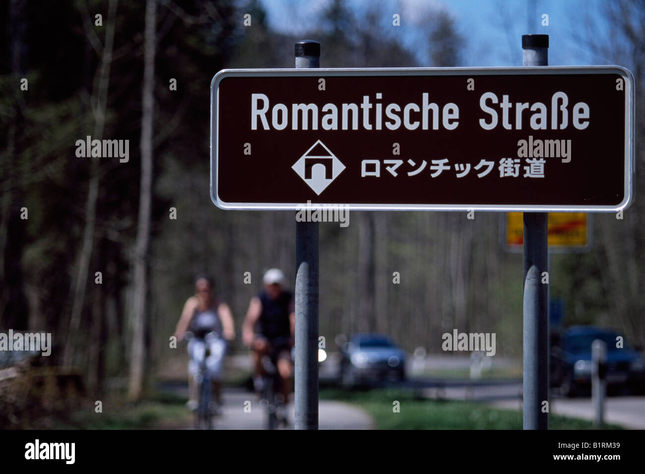 Roadsign for the Romantic road in German and Japanese, Bavaria, Germany Stock Photo