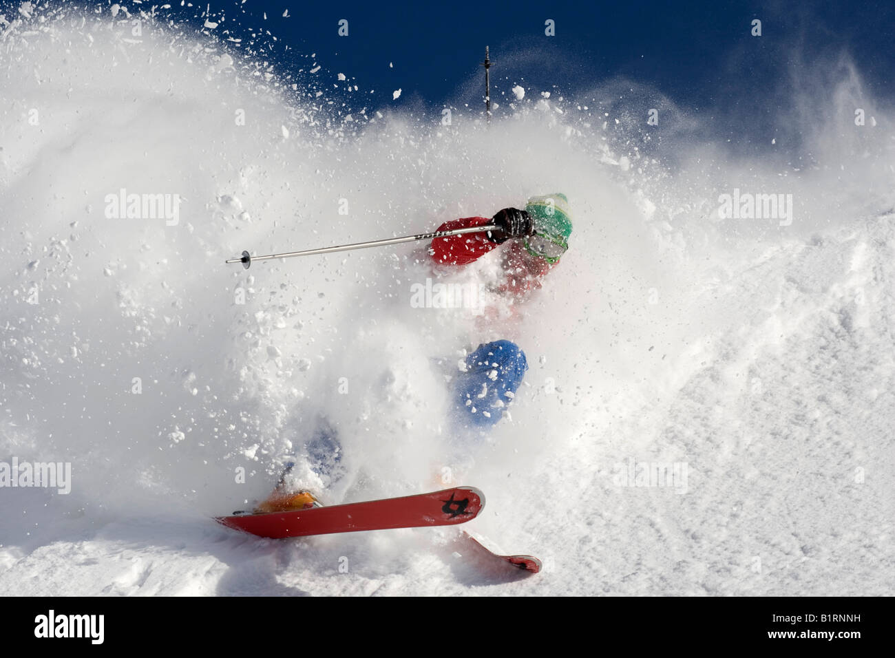 Ben Murphy in light deep powder snow in Alta ski resort, Utah USA Stock Photo