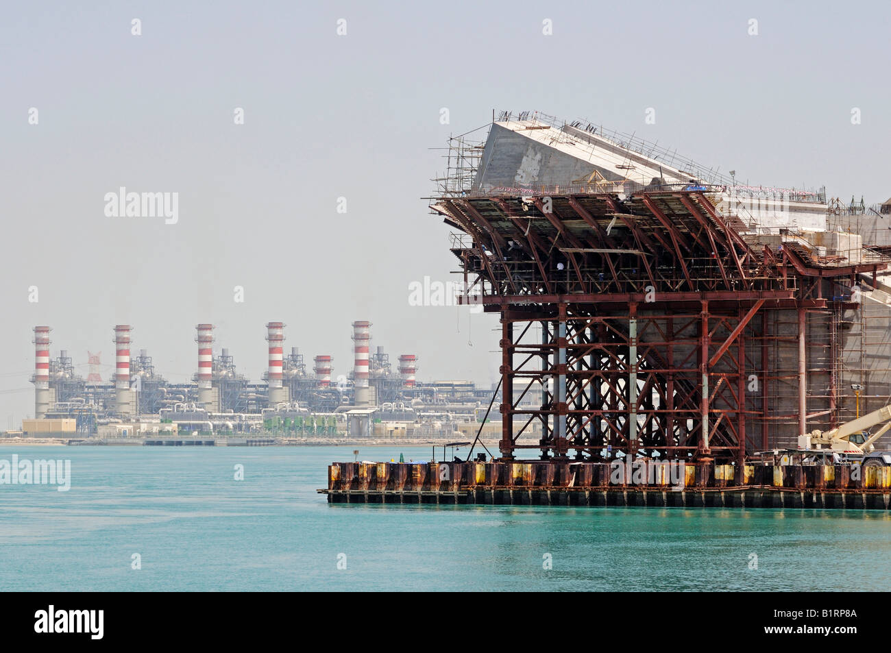 Bridge building site in front of gas-fired power plant, Abu Dhabi, United Arab Emirates, Asia Stock Photo