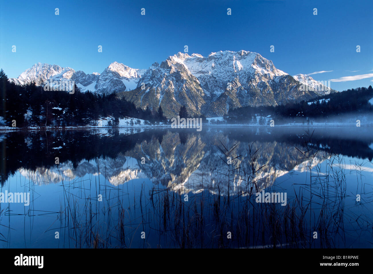 Karwendel Mountain Range reflected in the Luttensee Lake, Mittenwald, Bavaria, Germany, Europe Stock Photo