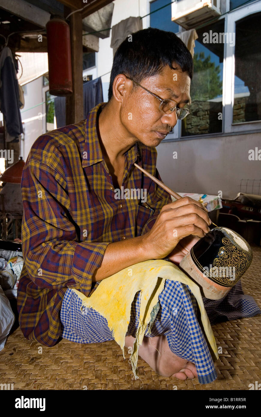 Painting craftsman, Bagan, Burma, Myanmar, Southeast Asia Stock Photo