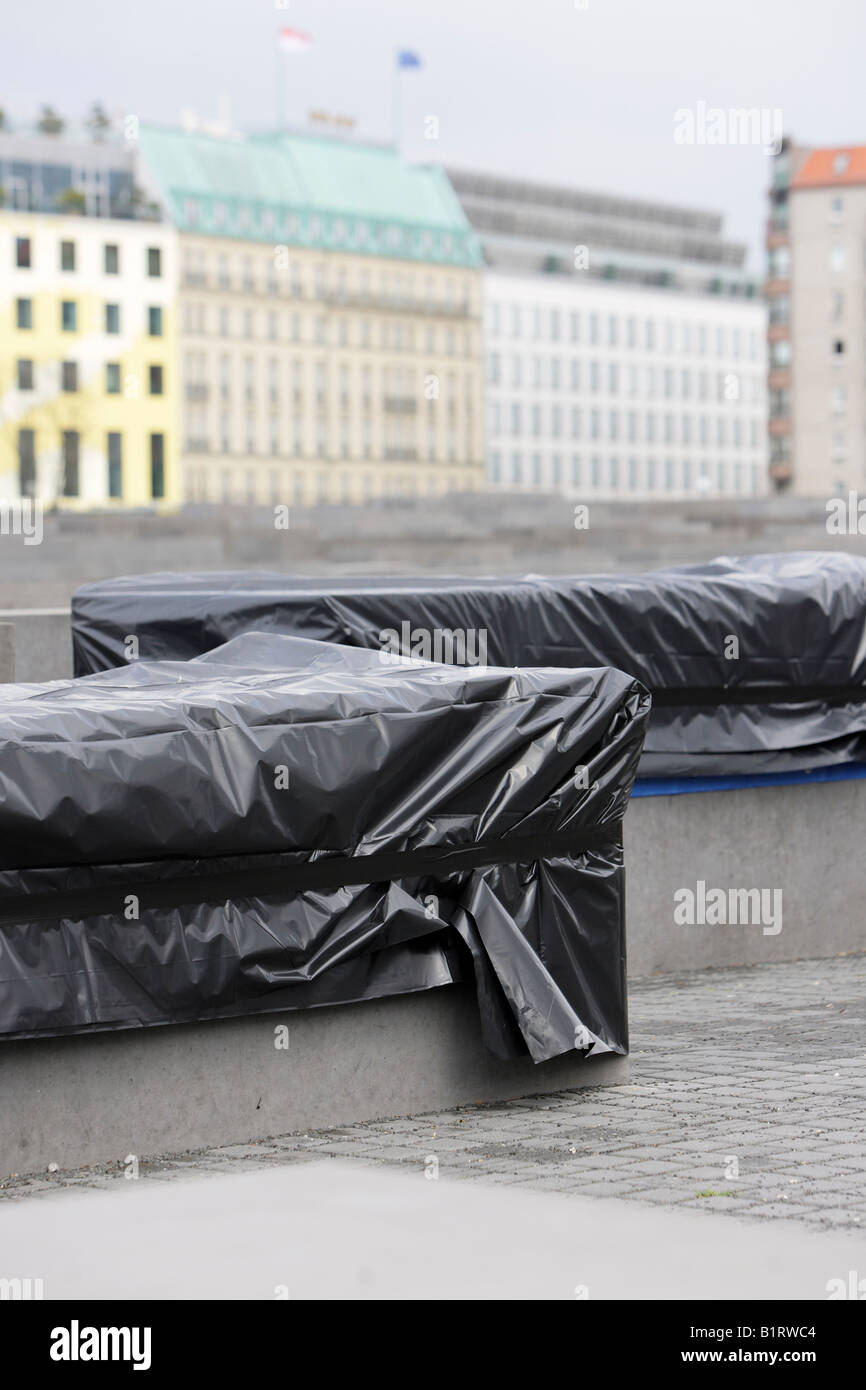 Black plastic sheets protecting damaged stones from the Monument to the Murdered Jews of Europe, Berlin, Germany, Europe Stock Photo