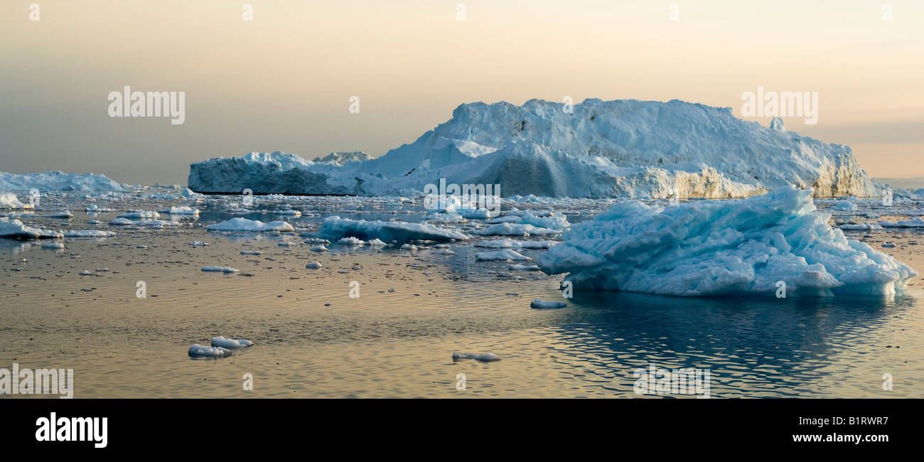 Panoramic view of icebergs circa midnight, Disko Bay near Ilulissat, western Greenland, Arctic, North America Stock Photo