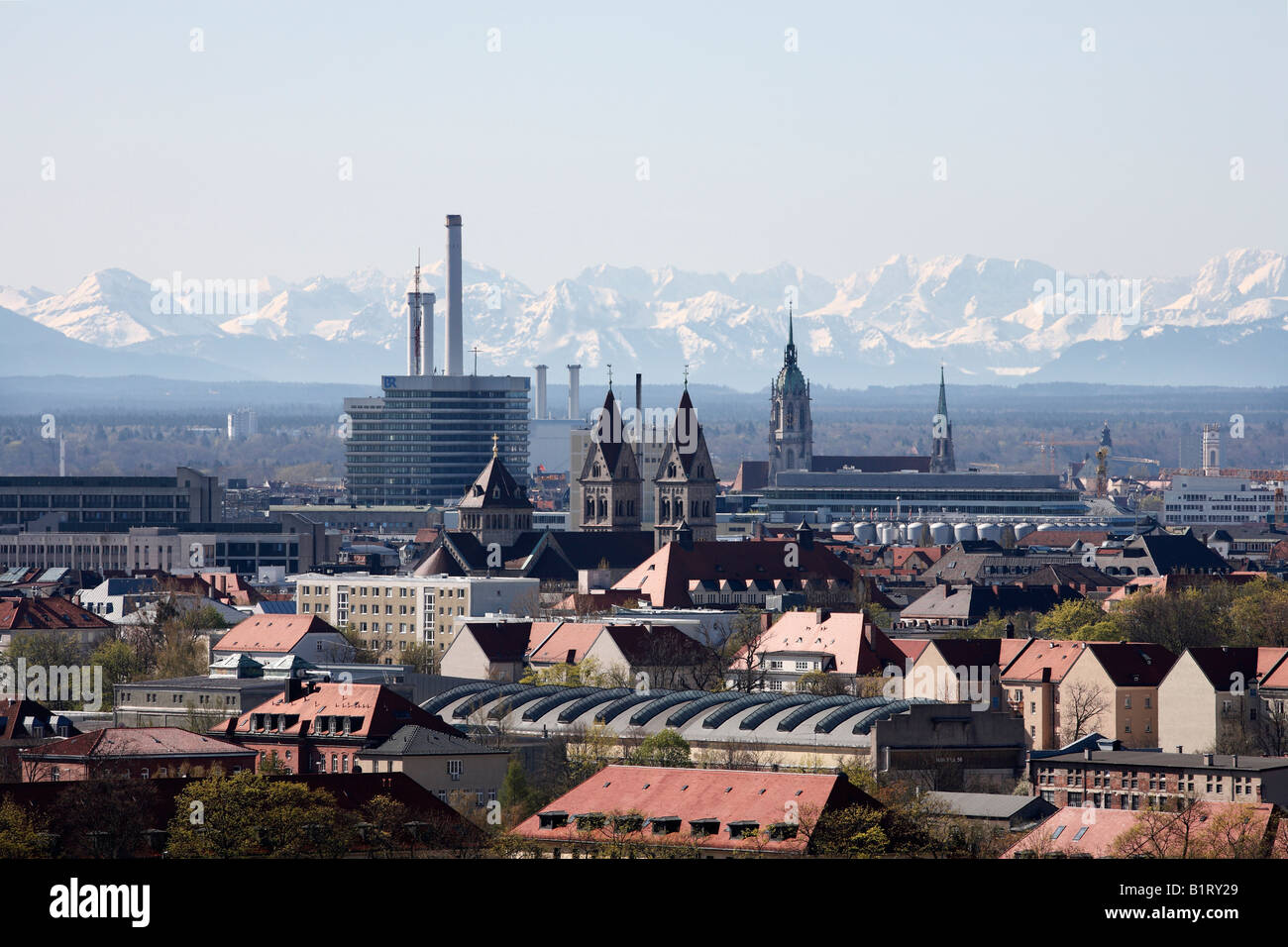Alp mountain range, St. Benno in Neuhausen and St. Paul as seen from Olympiaberg in the Olympic Park Stock Photo