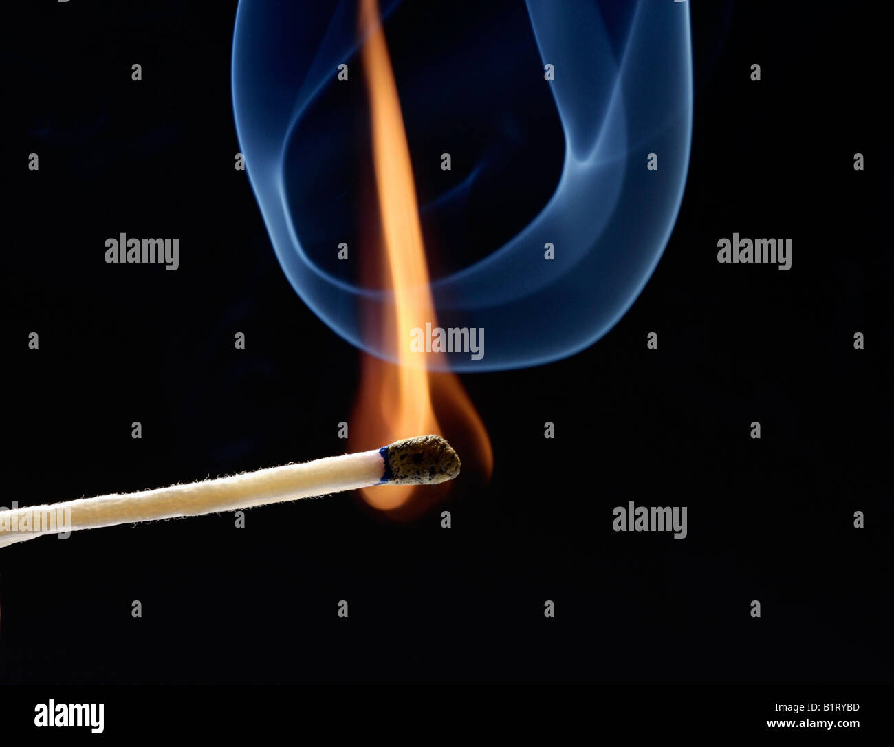 Burning match Stock Photo