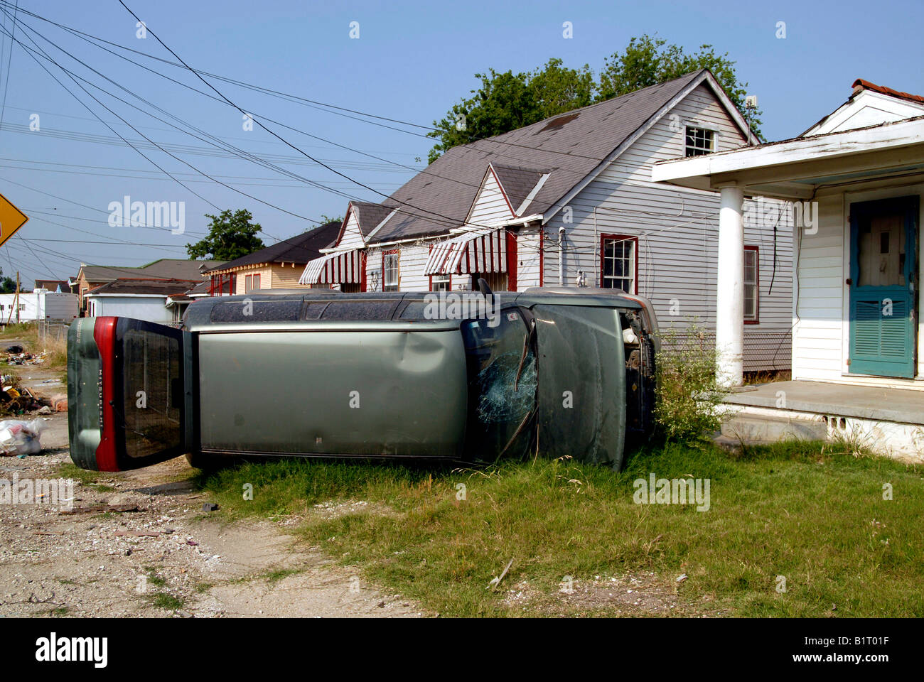 Car remains upturned ten months after the levees flooded New Orleans following Hurricane Katrina. New Orleans USA Stock Photo