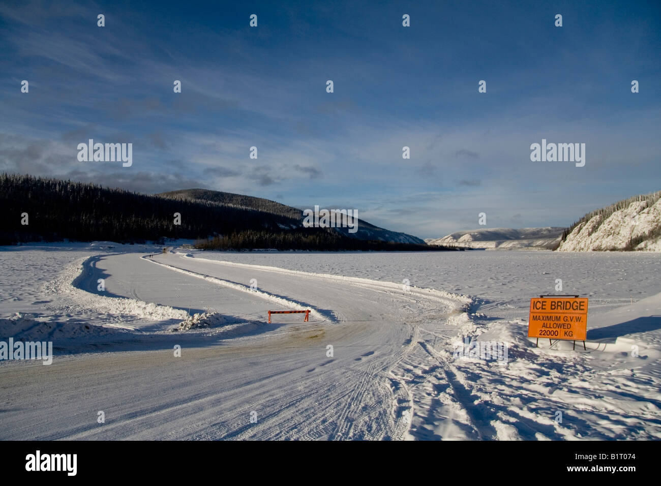 Traffic signs on the Yukon River Ice Bridge, Dawson City, Yukon Territory, Canada, North America Stock Photo
