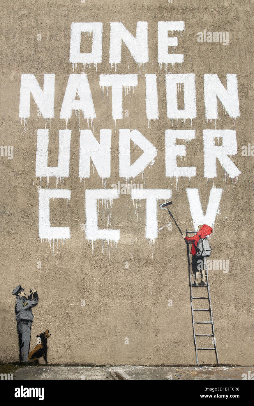 Banksy one nation under CCTV London UK Stock Photo
