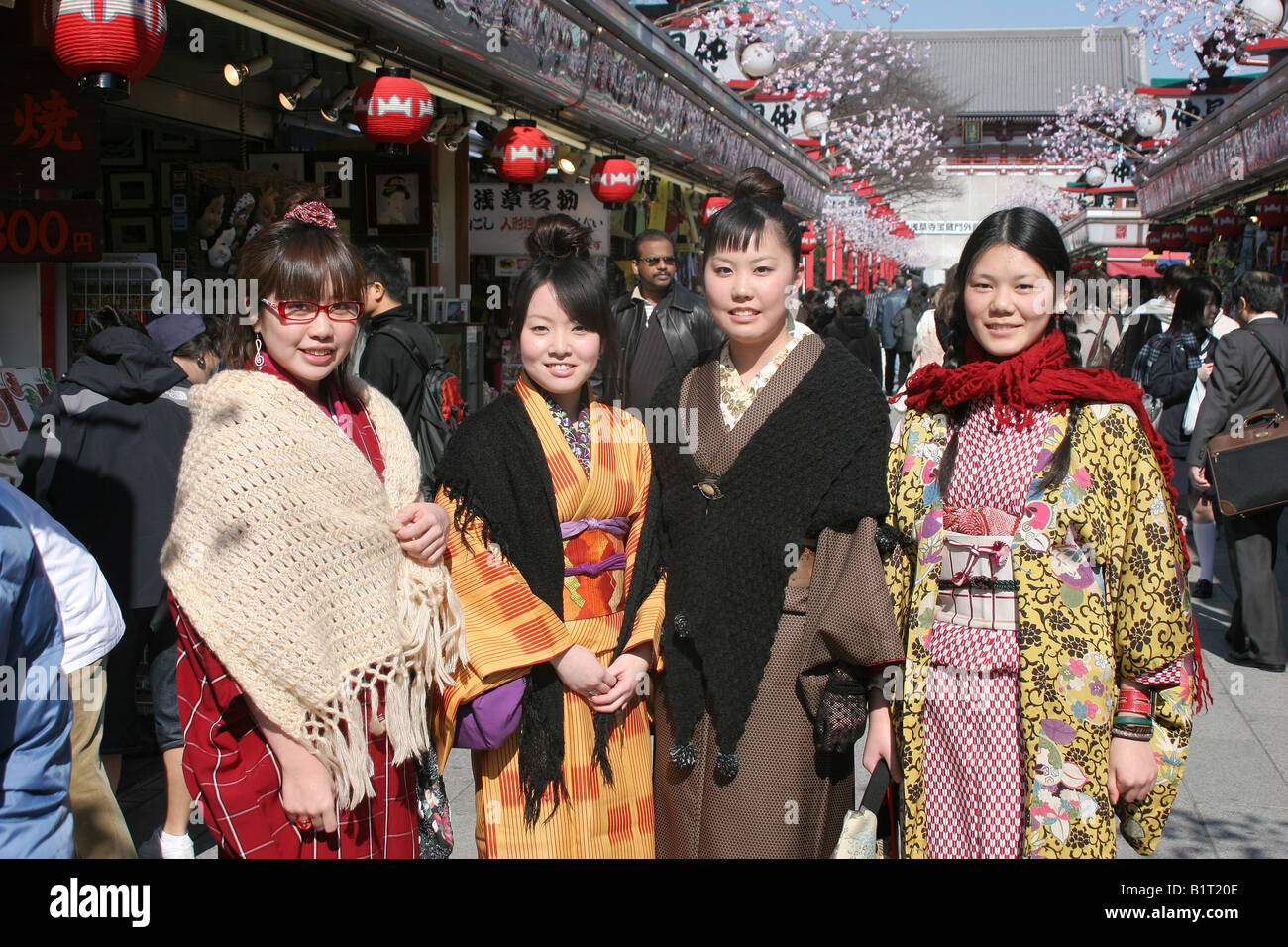 Young japanese women in traditional kimono on Nakamise Dori Street Asakusa Tokyo Japan Stock Photo