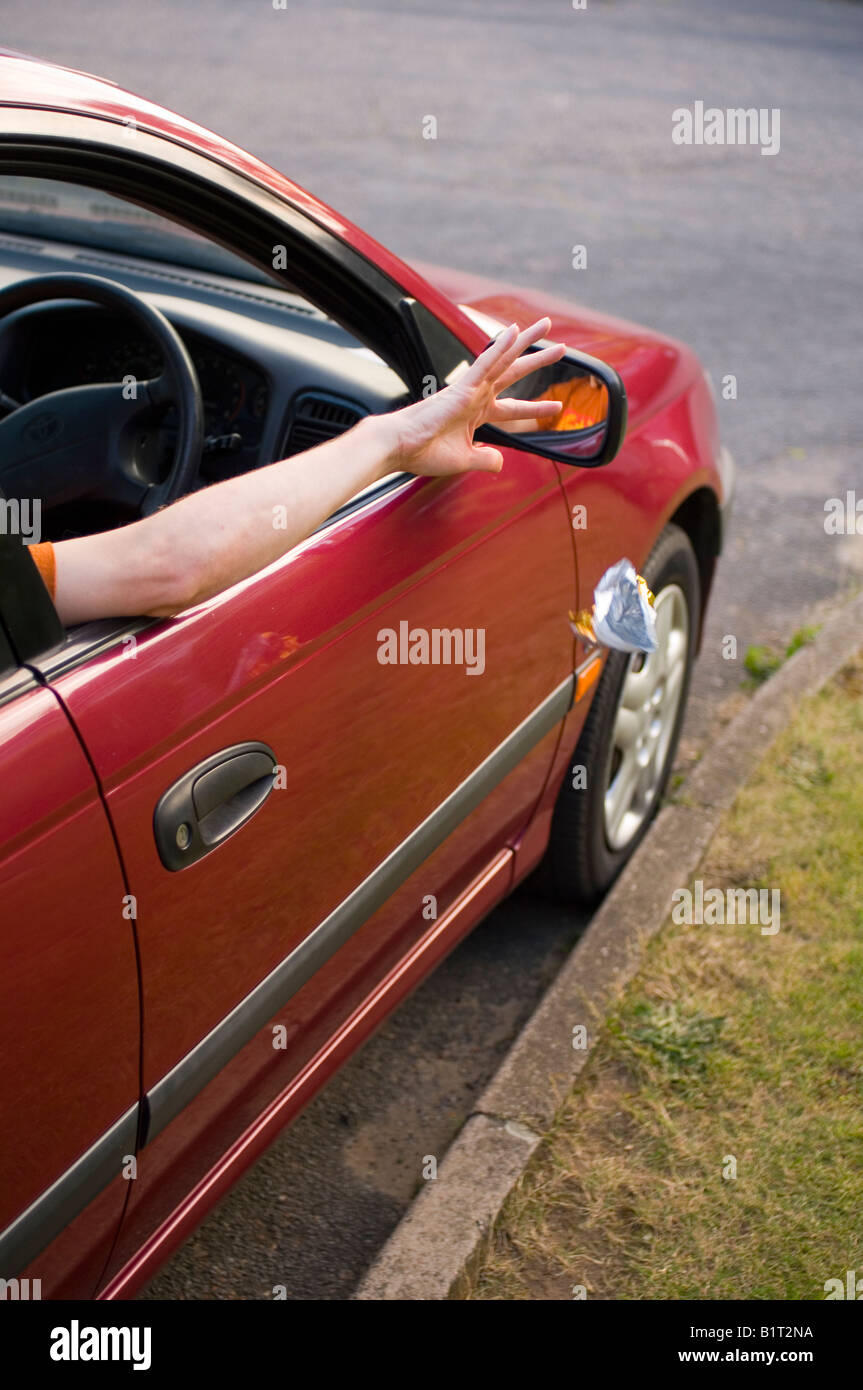 Person Throwing Litter From Car Window Stock Photo Alamy