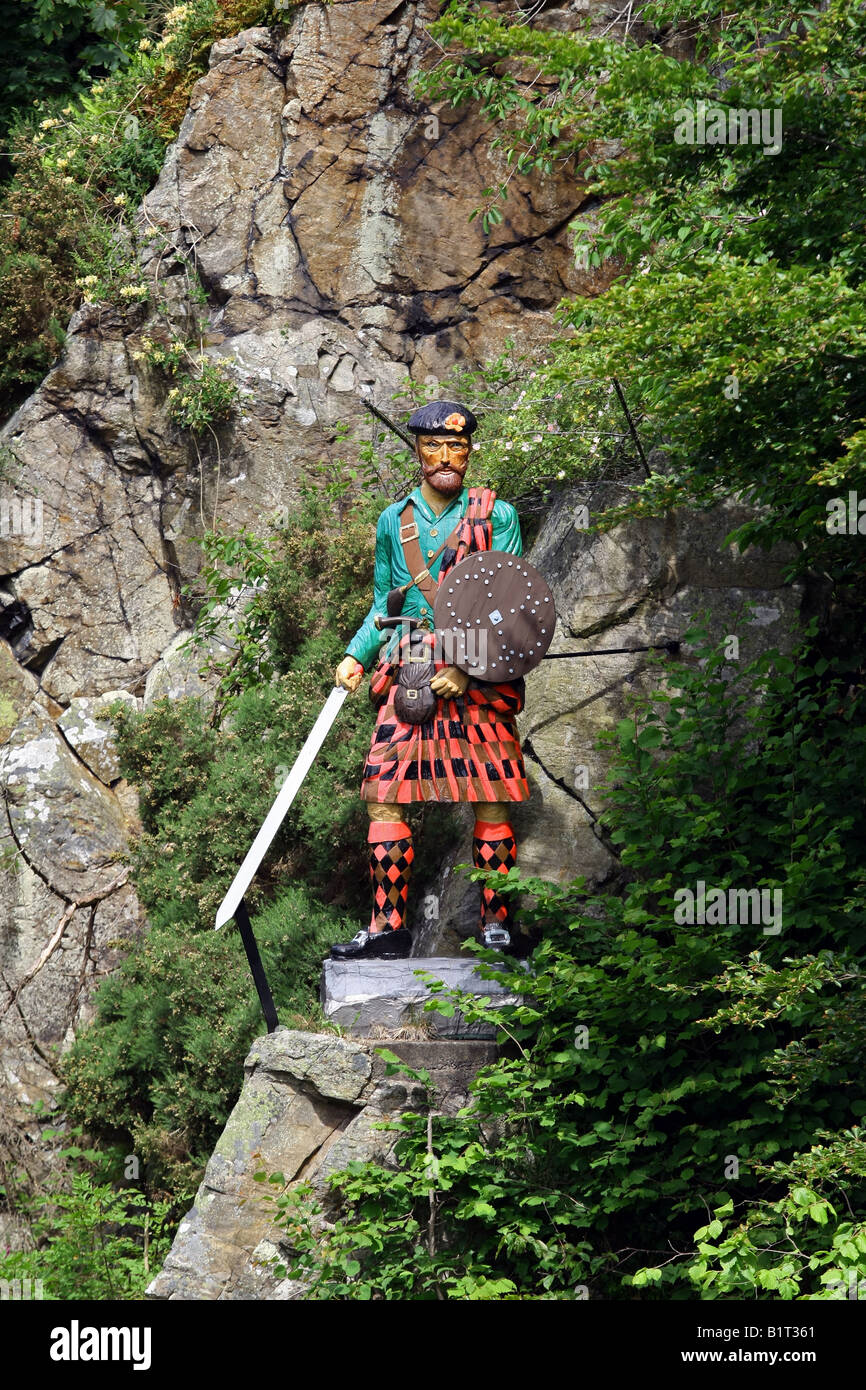 Statue of Scottish character Rob Roy McGregor over the Culter Burn at Peterculter, Aberdeenshire, Scotland, UK Stock Photo