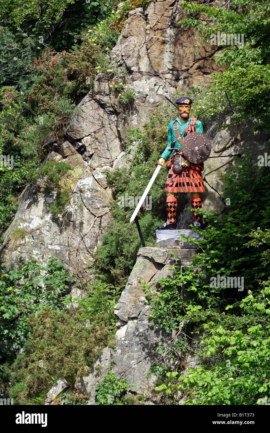 Statue of Scottish character Rob Roy McGregor over the Culter Burn at