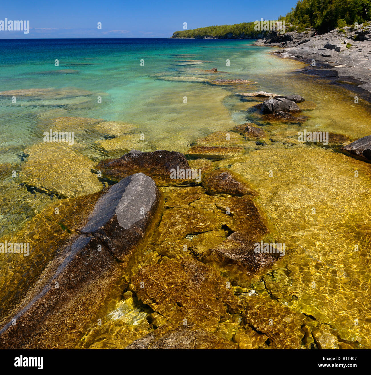 Clear clean water on the limestone shore of Little Cove Bruce Peninsula Georgian Bay Ontario Stock Photo