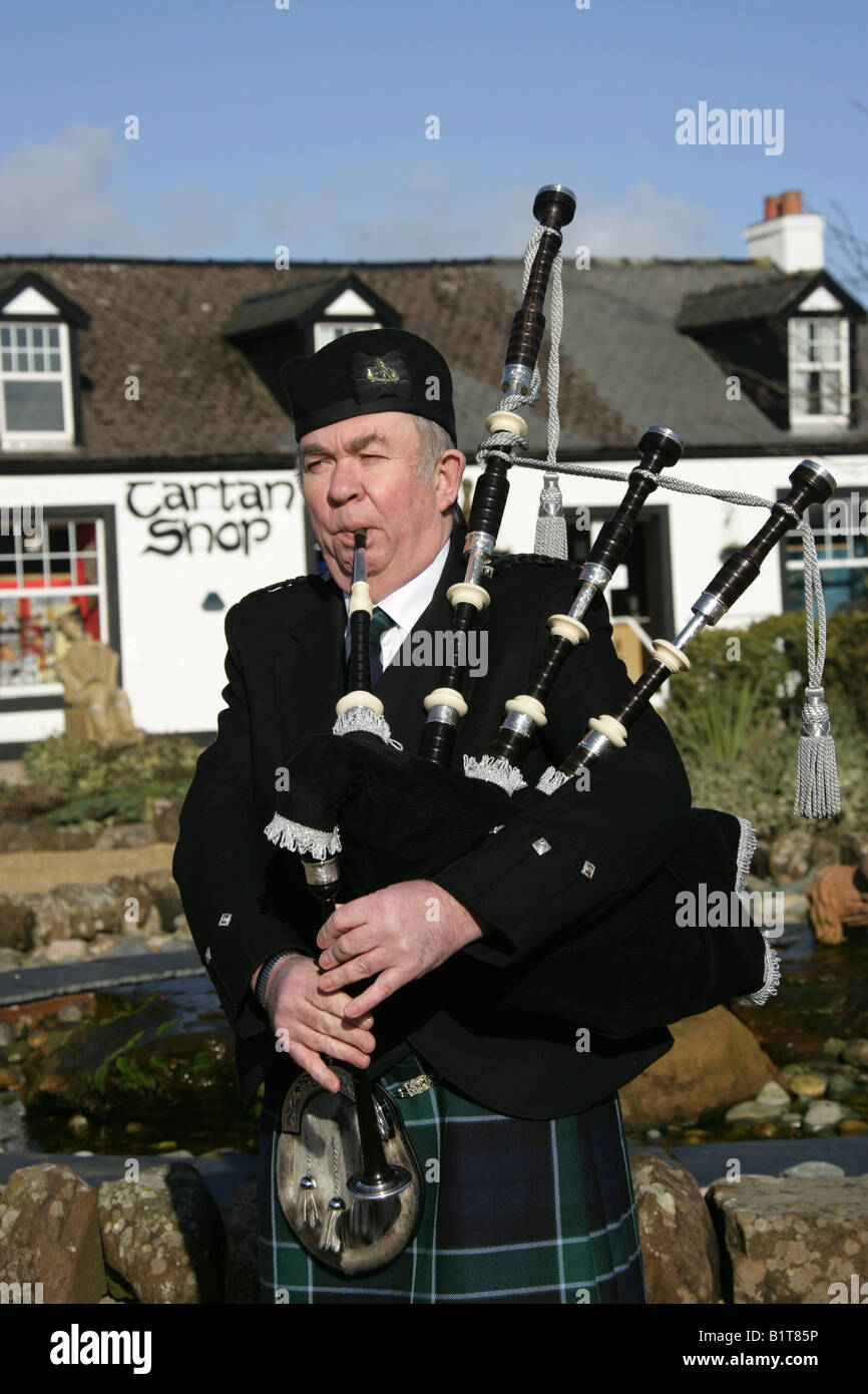 Gretna Green, Scotland. Scottish Piper playing the bagpipes for a