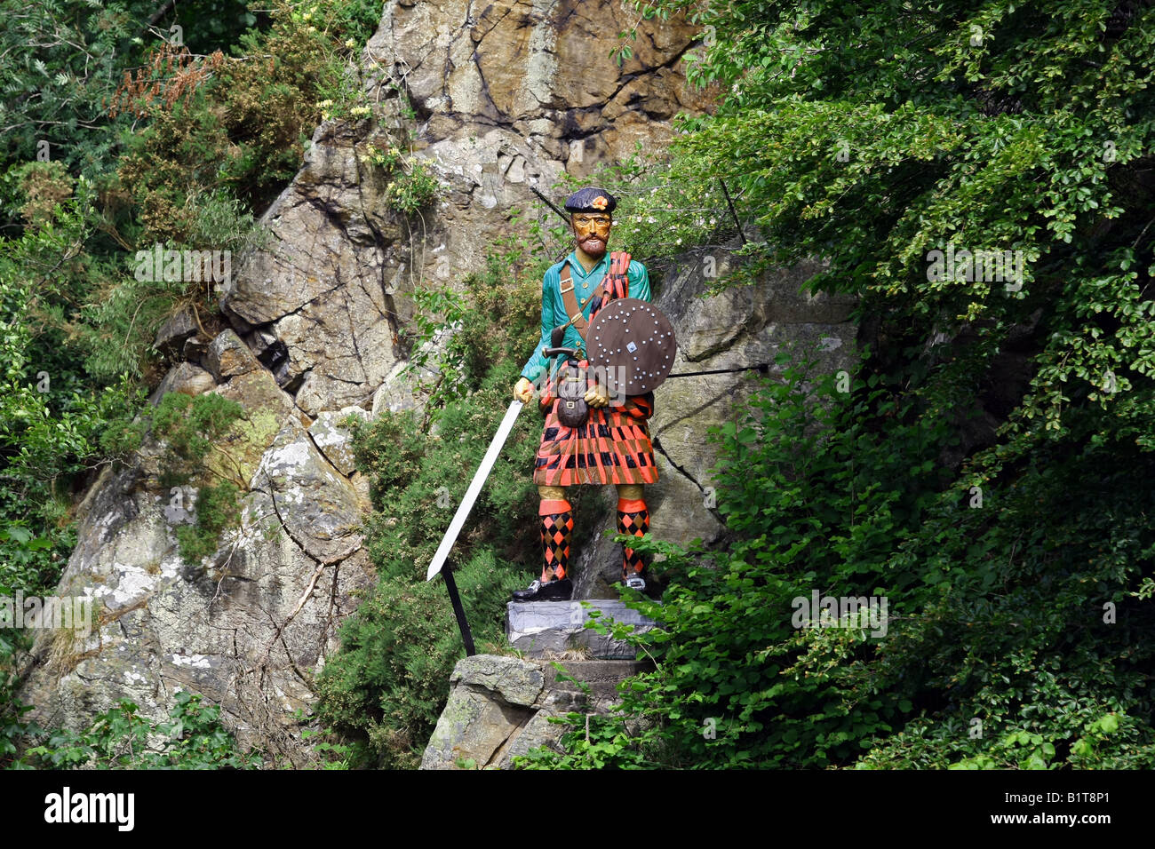 Statue of Scottish character Rob Roy McGregor over the Culter Burn at Peterculter, Aberdeenshire, Scotland, UK Stock Photo