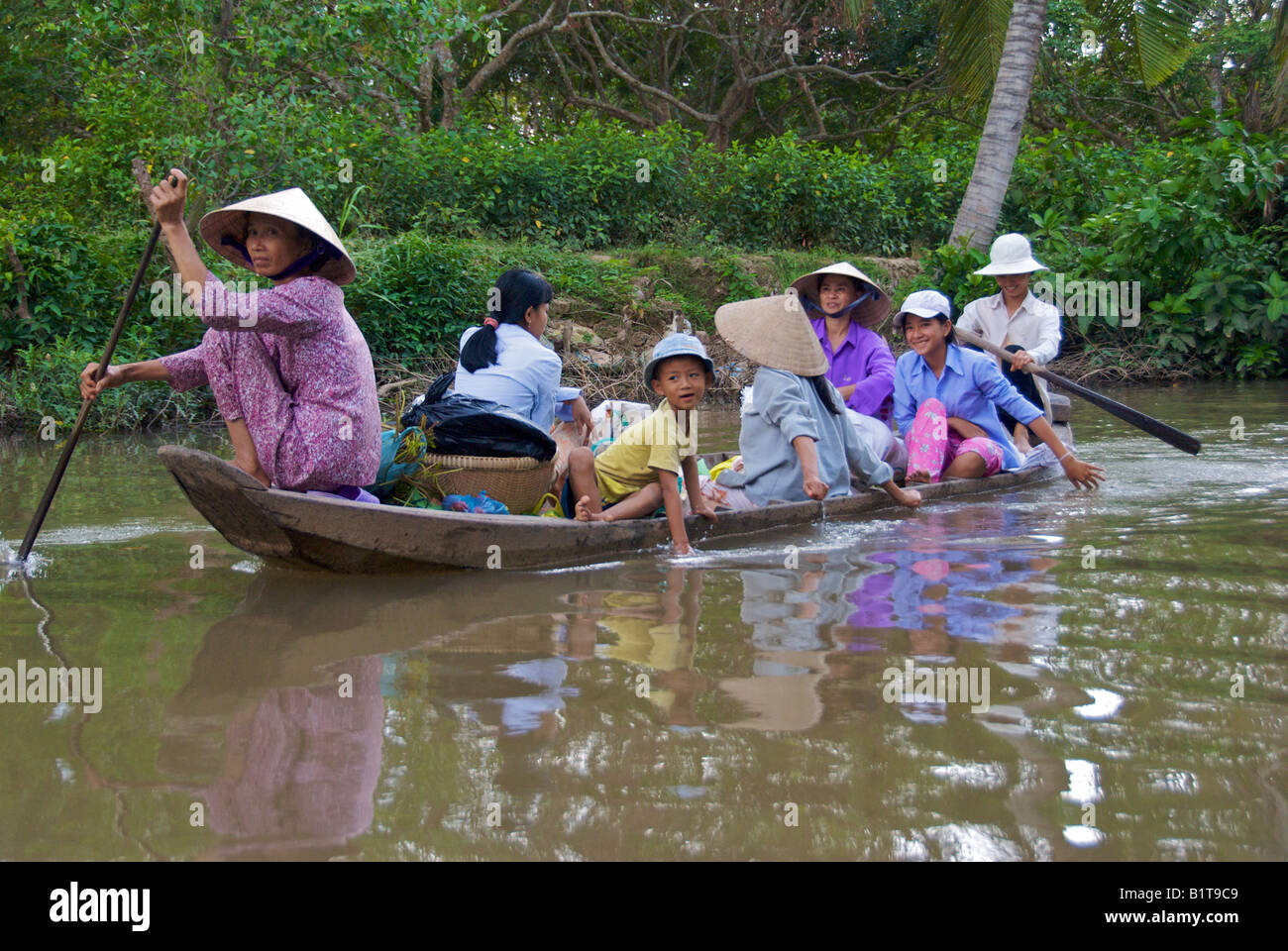Overloaded traditional boat mekong delta hi-res stock photography and ...