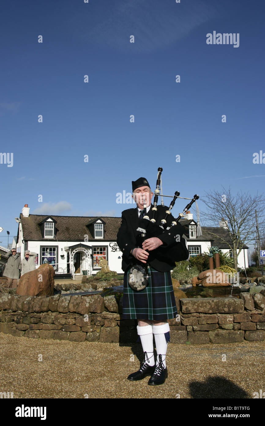 Gretna Green, Scotland. Scottish Piper playing the bagpipes for a
