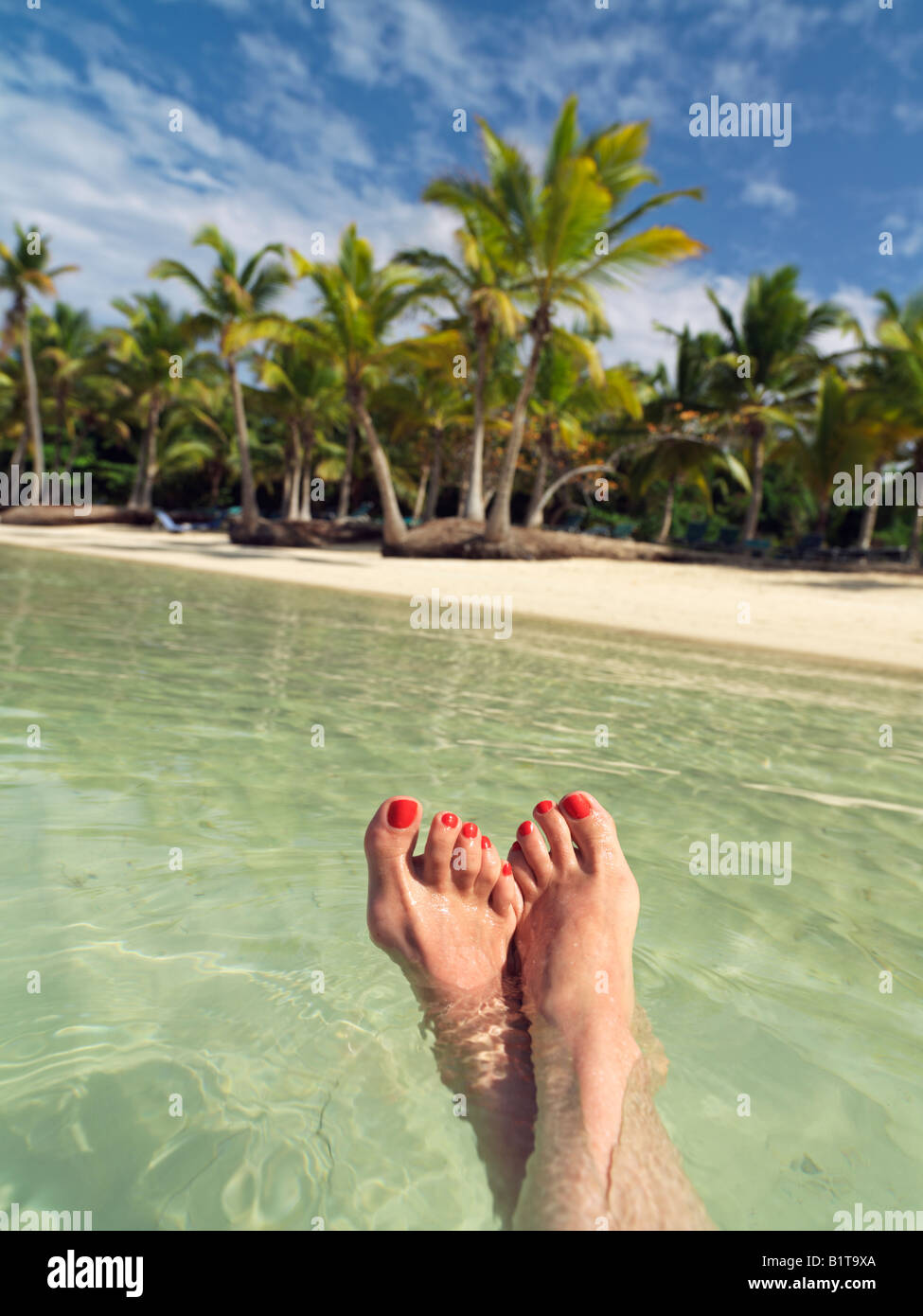 Dominican Republic Punta Cana Bavaro Beach woman s feet floating in