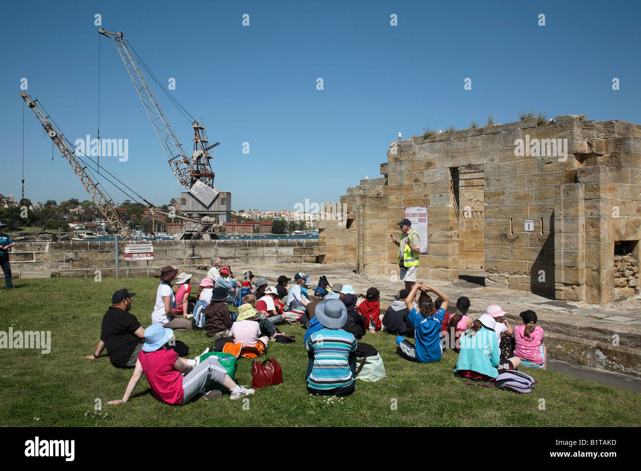 School Children on a Guided Tour at the Military Guard House Convict Precinct Cockatoo Island Sydney New South Wales Australia Stock Photo