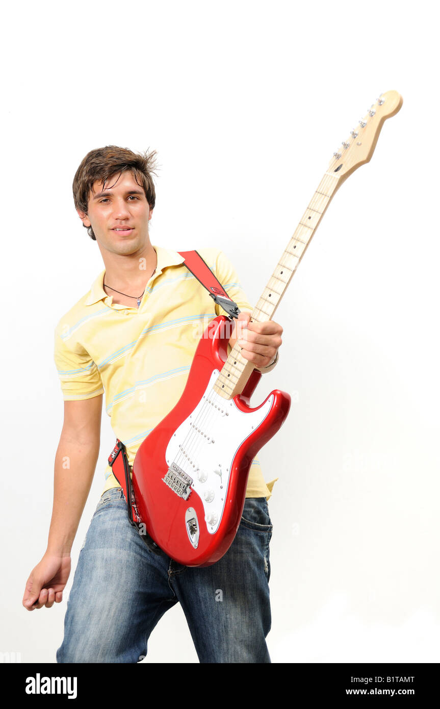 Portrait of trendy teen playing electric guitar - isolated Stock Photo