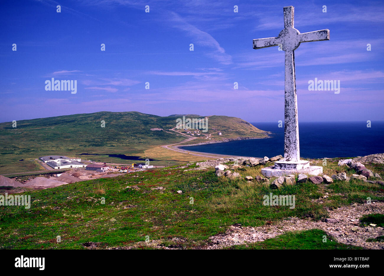 A cross on a hill overlooking the village of Miquelon, St. Pierre et Miquelon Stock Photo